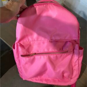 Backpack pink with gold zipper - some pencil or marks but in good condition